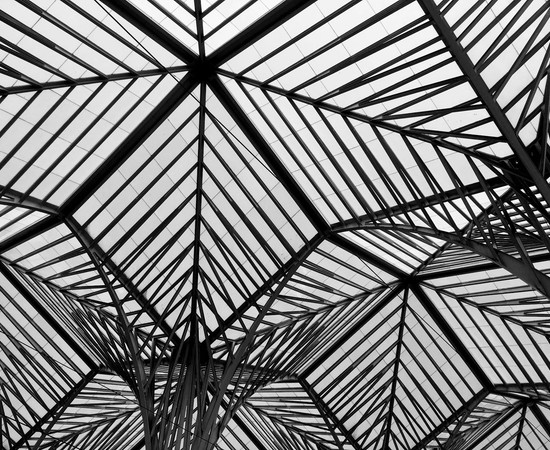 Unique geometric architecture with a metal frame roof in Lisbon, Portugal.